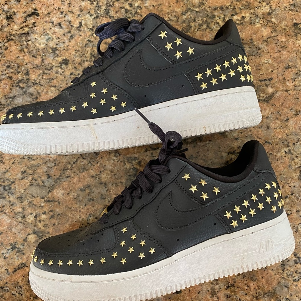 Nike Air Force ones black and gold